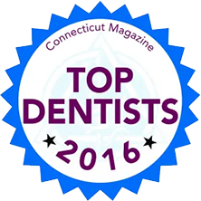 The image shows a badge with text that reads  CONCORD NEW HAMPSHIRE  at the top, followed by  TOP DENTISTS 2016  in large letters, and below that,  DENTIST MAGAZINE  in smaller font. There is a blue star-shaped background behind the badge with the text  TOP DENTISTS 2016  on it. The style of the image suggests it is an award or recognition for dentists in Concord, New Hampshire.